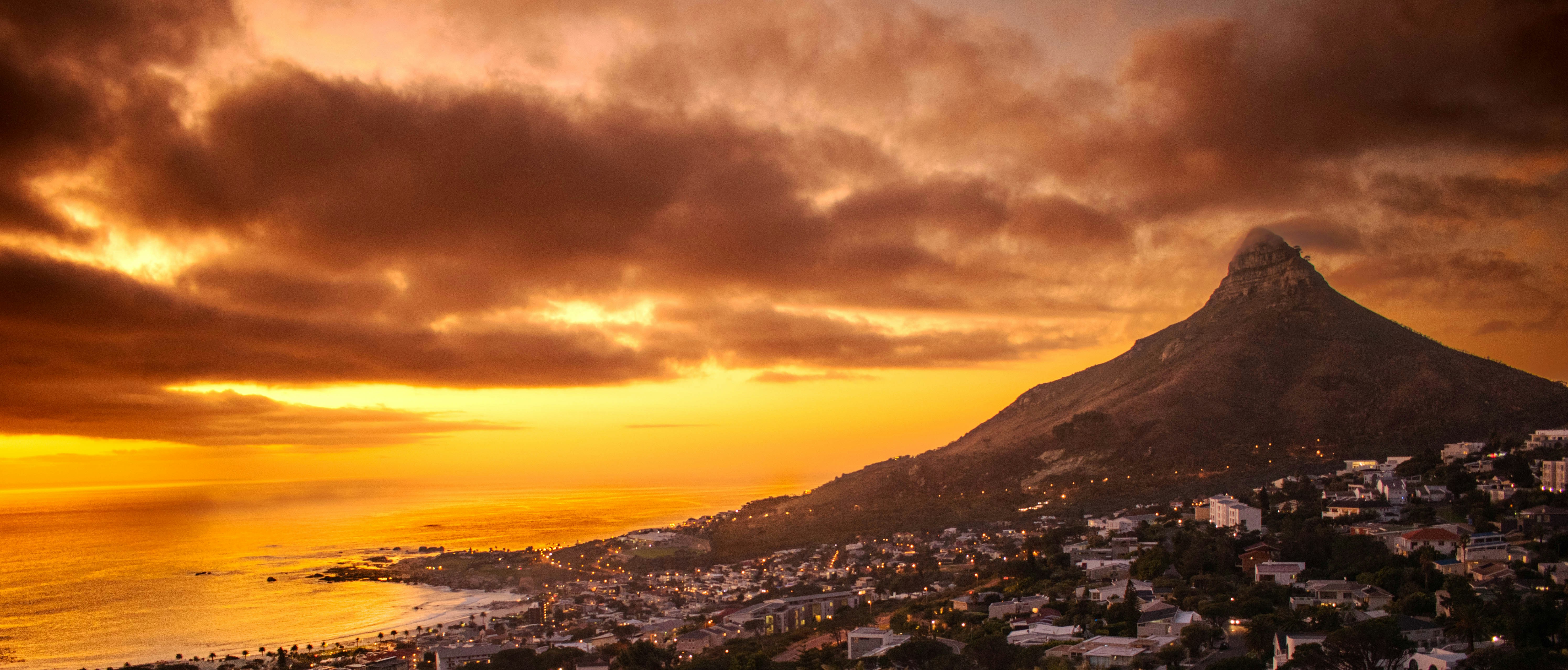 Golden sunset over Lion's Head and the Cape Town coastline