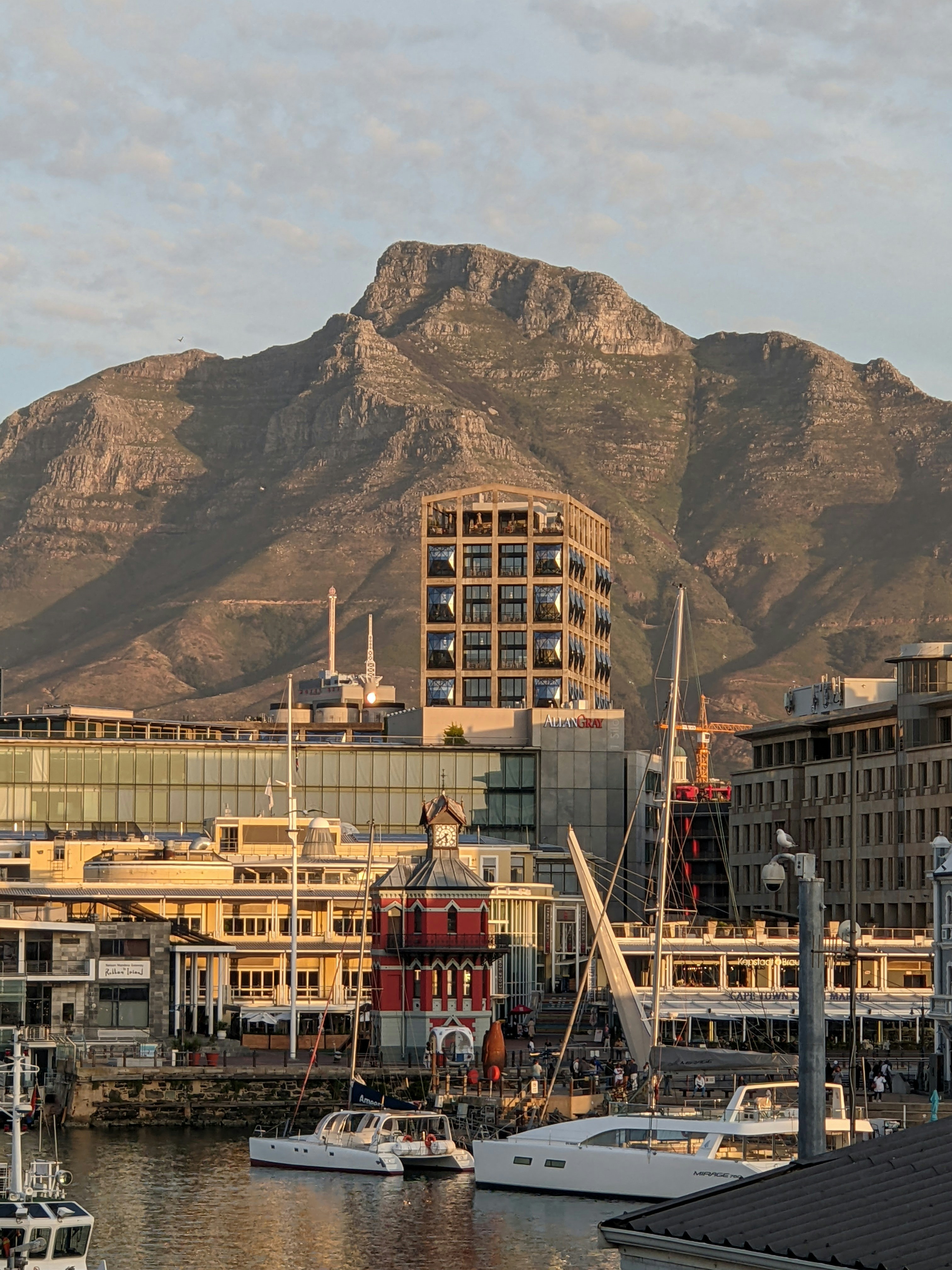 Table Mountain at golden hour over the V&A Waterfront in Cape Town